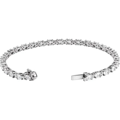 White gold bracelet with lab grown diamonds on a white background